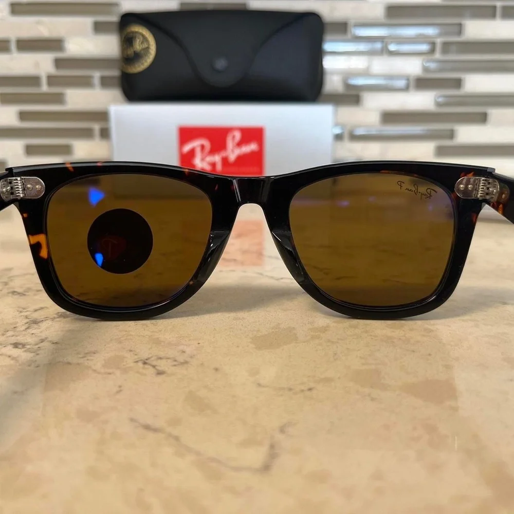 Ray-Ban Wayfarer Classic Black and Brown Polarized Sunglasses.